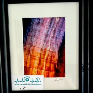 Photo by a local artist in a frame.